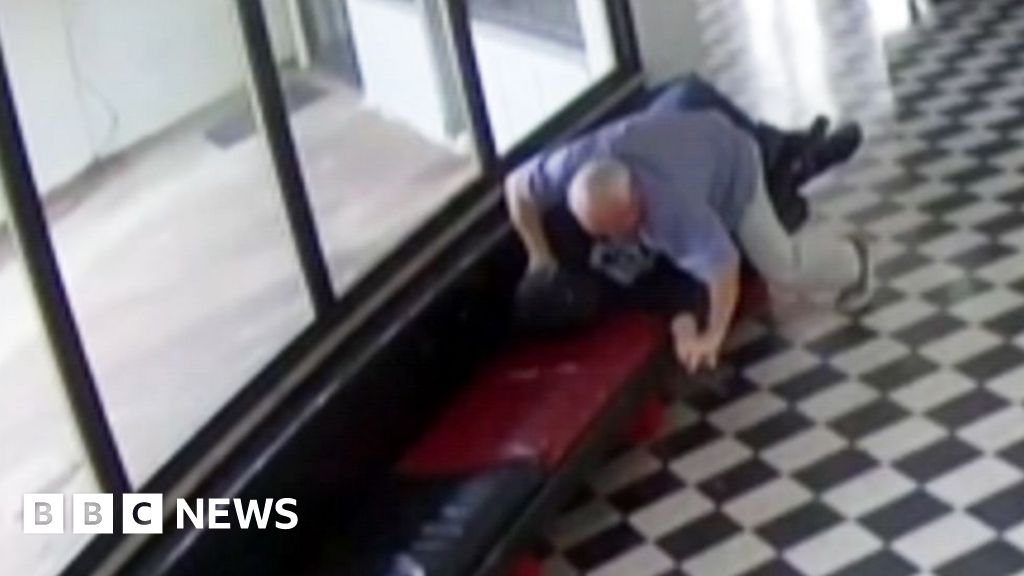 Moment gunman tackled by school principal